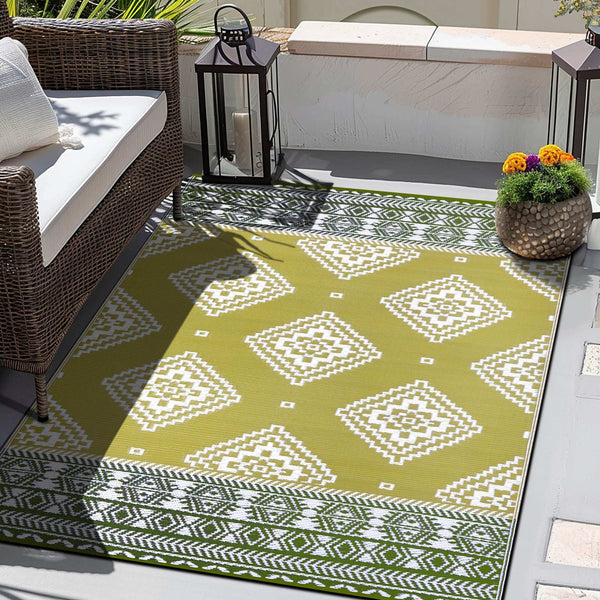 Green Decore outdoor rug styled in an outdoor seating area