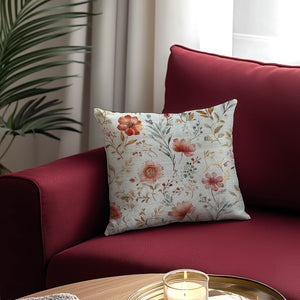 Green Decore Vernal Calisto Red, Pink and Green Indoor Cushion on a burgundy sofa. Featuring a delicate floral print, this cushion enhances vintage décor, romantic interiors, cosy living rooms, and elegant soft furnishings with a soft, botanical charm.
