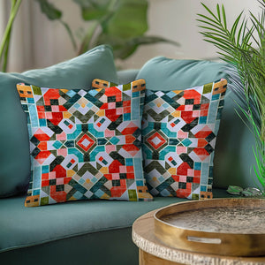 Green Decore Vernal Casca Multicolor Indoor Cushions displayed on a teal sofa. These vibrant cushions feature bold geometric patterns—perfect for boho décor, colourful interiors, modern home styling, and adding personality to living rooms, sofas, or bedroom accents.
